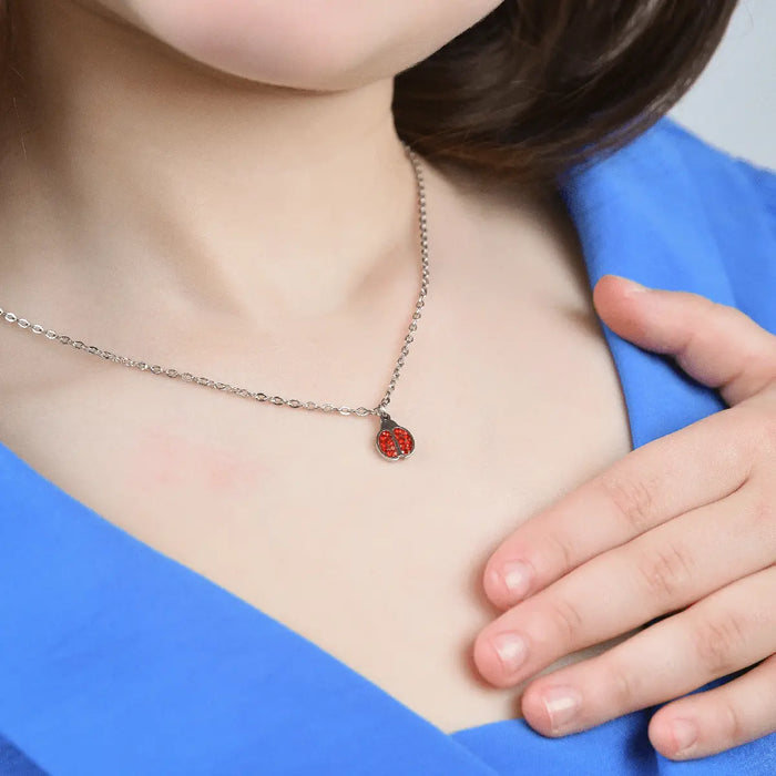 COLLANA BAMBINA IN ACCIAIO CON COCCINELLA E CRISTALLI ROSSI